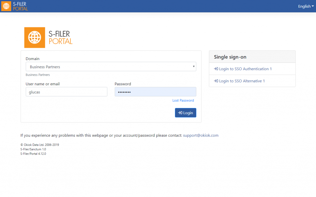 The S-Filer Portal sign-in page with a Single sign-on panel on the right listing two named SSO providers, beside the domain, user name and password form.