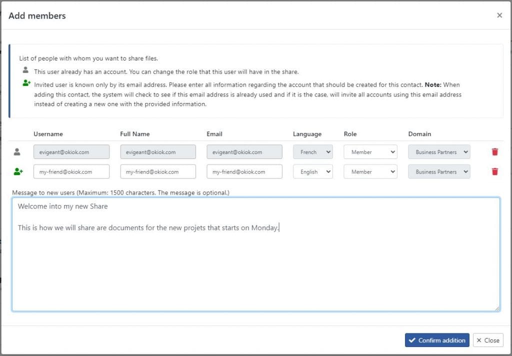 An Add members dialog for a share: one row per person with user name, full name, email, language, role and domain, one icon marking a person who already has an account and another marking an invited contact known only by email, above an optional welcome message to new users.